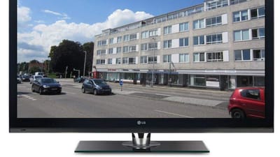 En stor, tynd fladsk&aelig;rm, der kan vise de sk&oslash;nneste dr&oslash;mmebilleder til alle i stuen.